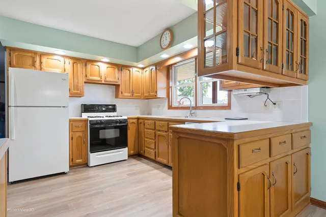 a spacious bedroom with a bed and a large window
