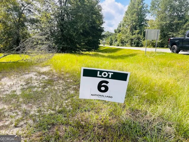 a view of a outdoor space with swimming pool