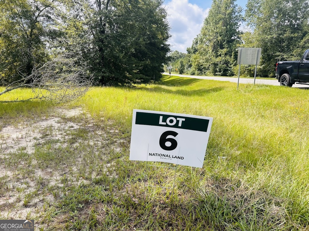 a view of a outdoor space with swimming pool