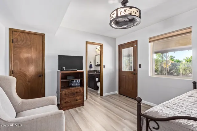 a view of a livingroom with furniture and windows
