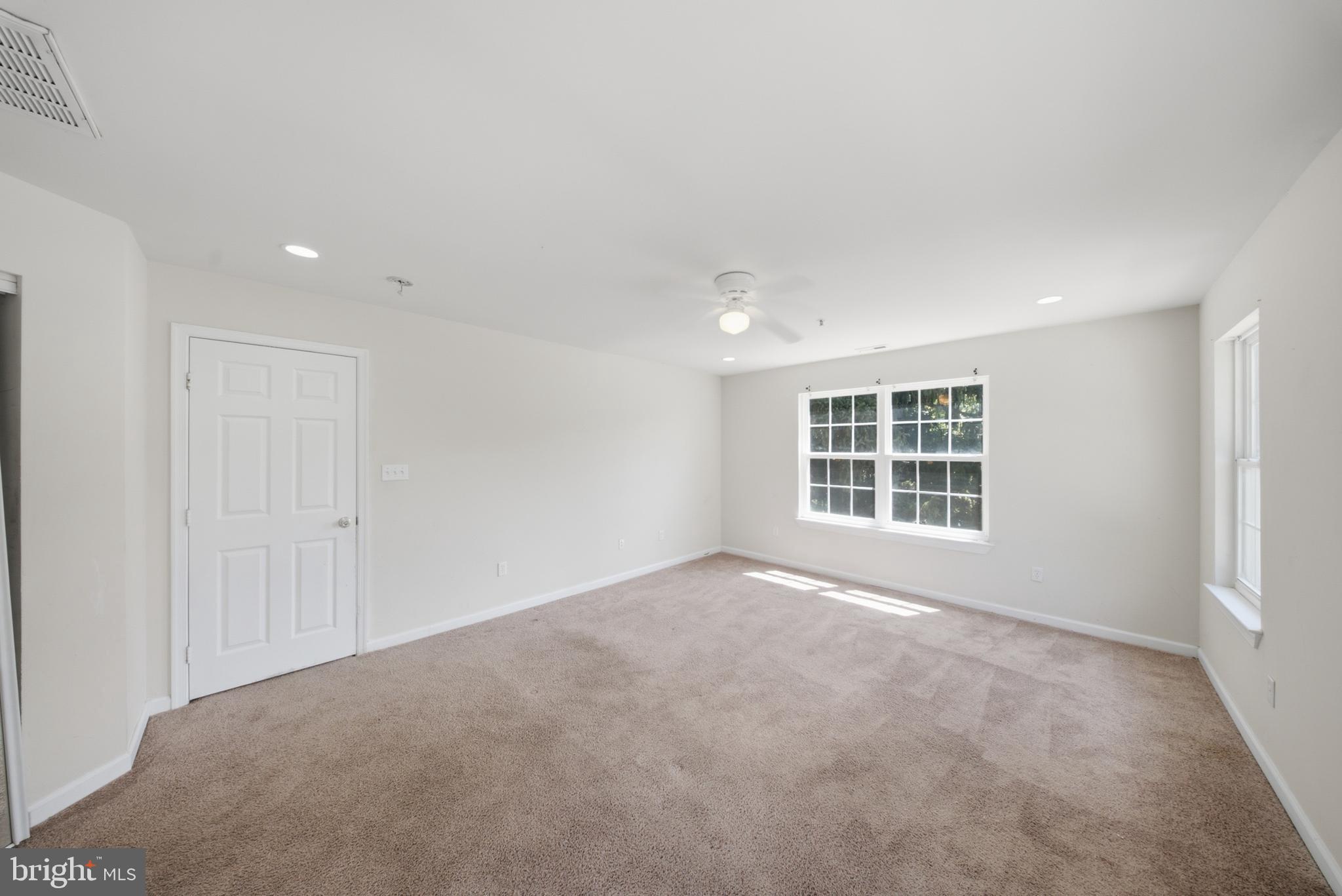7611 Temple Hill Road Temple Hills, MD 20748 - Photo 12 of 25 an empty room with windows