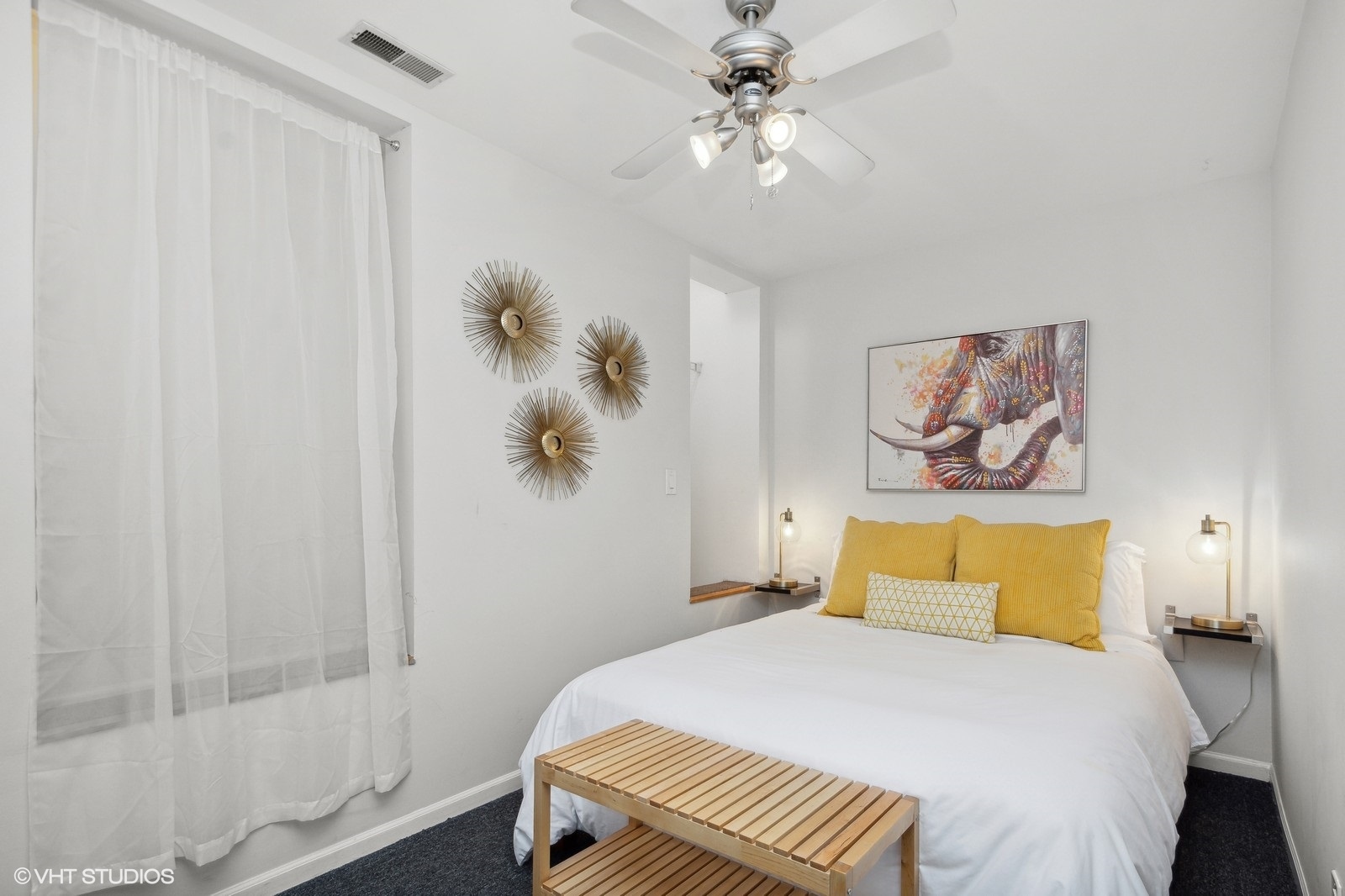 2008 West Roscoe Street, Unit 2 Chicago, IL 60618 - Photo 11 of 13 a bedroom with a bed and a painting on the wall