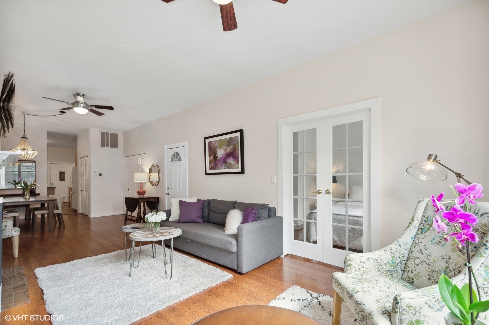 2008 West Roscoe Street, Unit 2 Chicago, IL 60618 - Photo 4 of 13 a living room with furniture and wooden floor