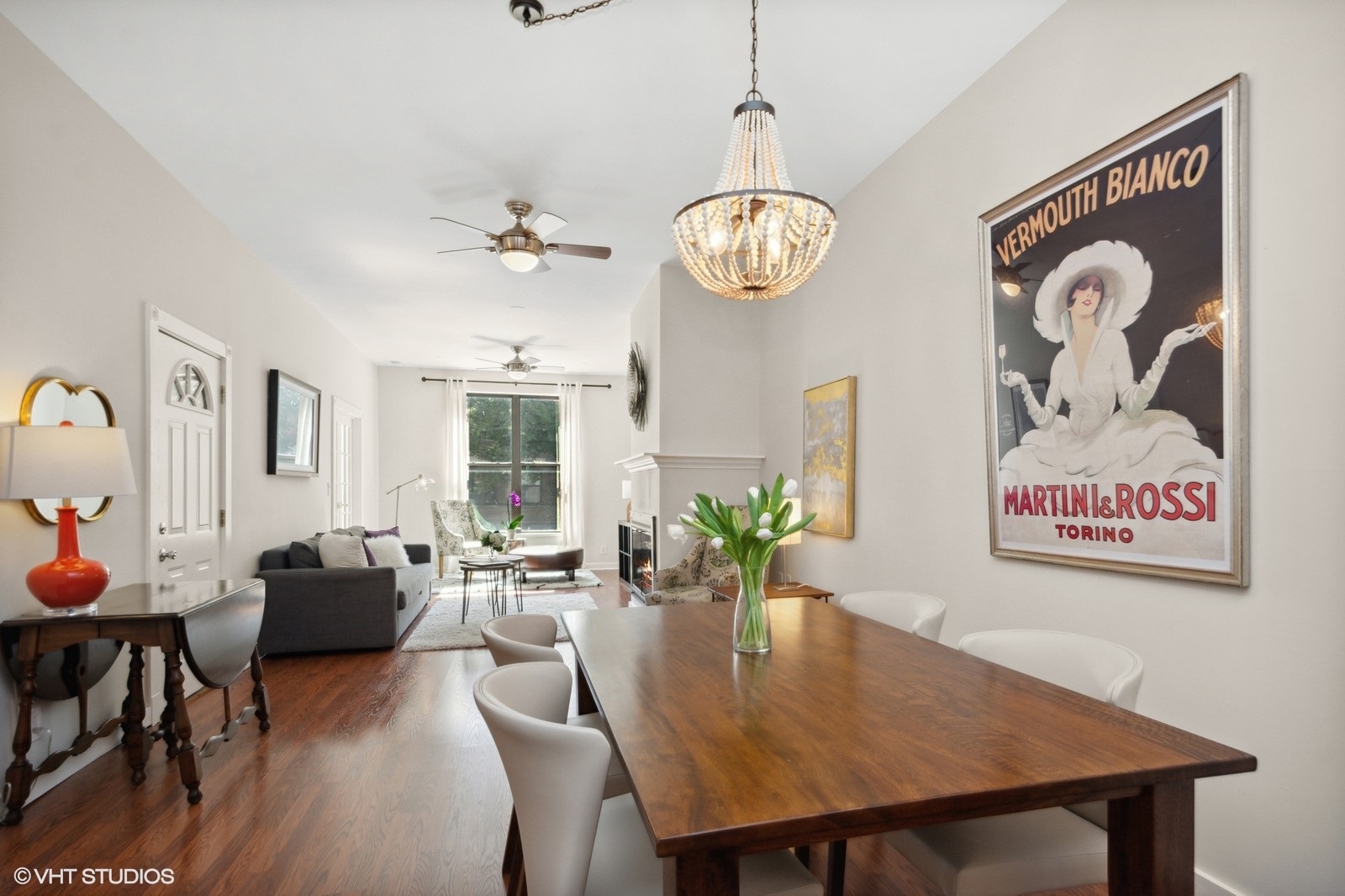2008 West Roscoe Street, Unit 2 Chicago, IL 60618 - Photo 7 of 13 a view of a dining room with furniture window and wooden floor