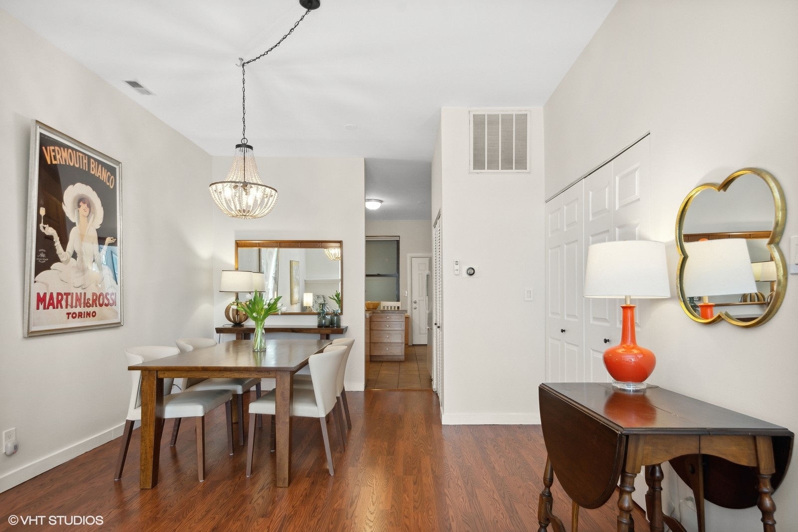 2008 West Roscoe Street, Unit 2 Chicago, IL 60618 - Photo 8 of 13 a view of a dining room with furniture and wooden floor