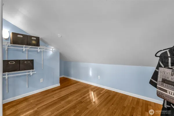 a view of a livingroom with wooden floor