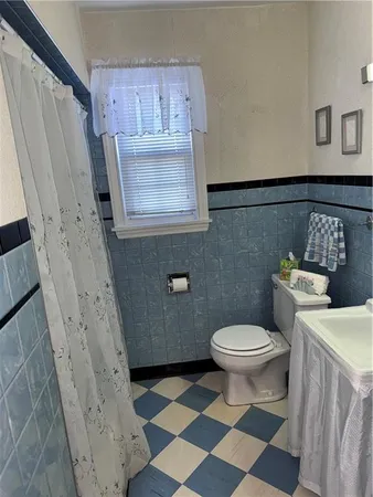 a bathroom with a sink and a toilet