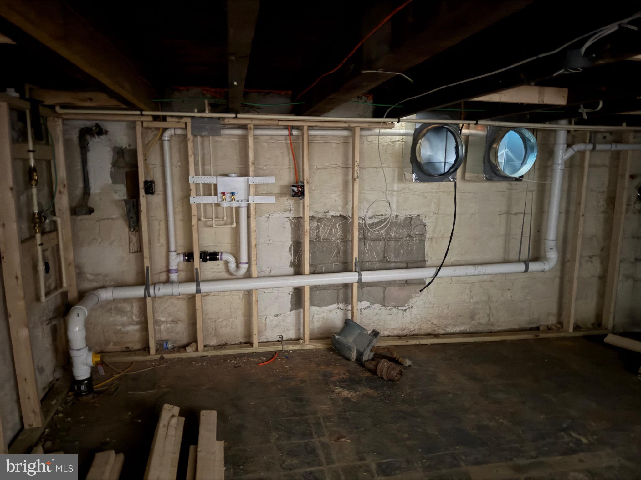 4907 Edgemere Avenue Baltimore, MD 21215 - Photo 11 of 15 a room with wooden walls and glass door