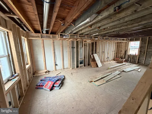a view of a room with wooden walls