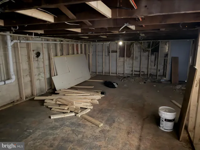 a view of a room with wooden walls