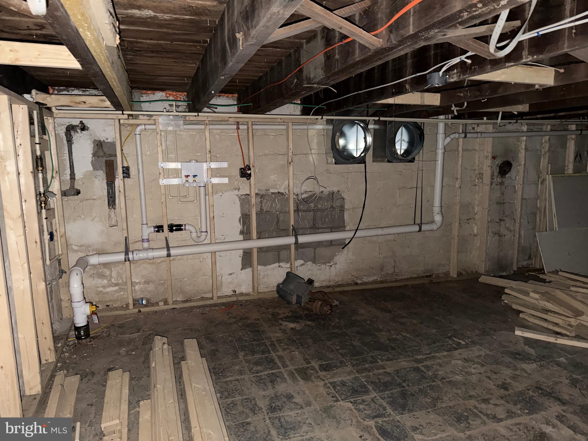 4907 Edgemere Avenue Baltimore, MD 21215 - Photo 10 of 15 a view of a room with wooden walls