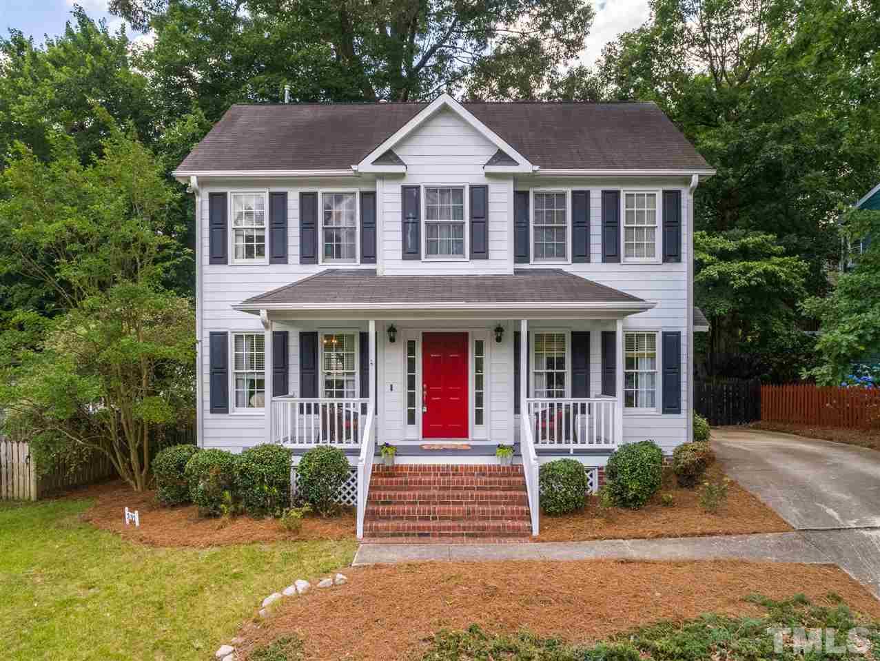 5105 Knightsbridge Way Raleigh, NC 27604 - Photo 1 of 25 front view of brick house with a yard