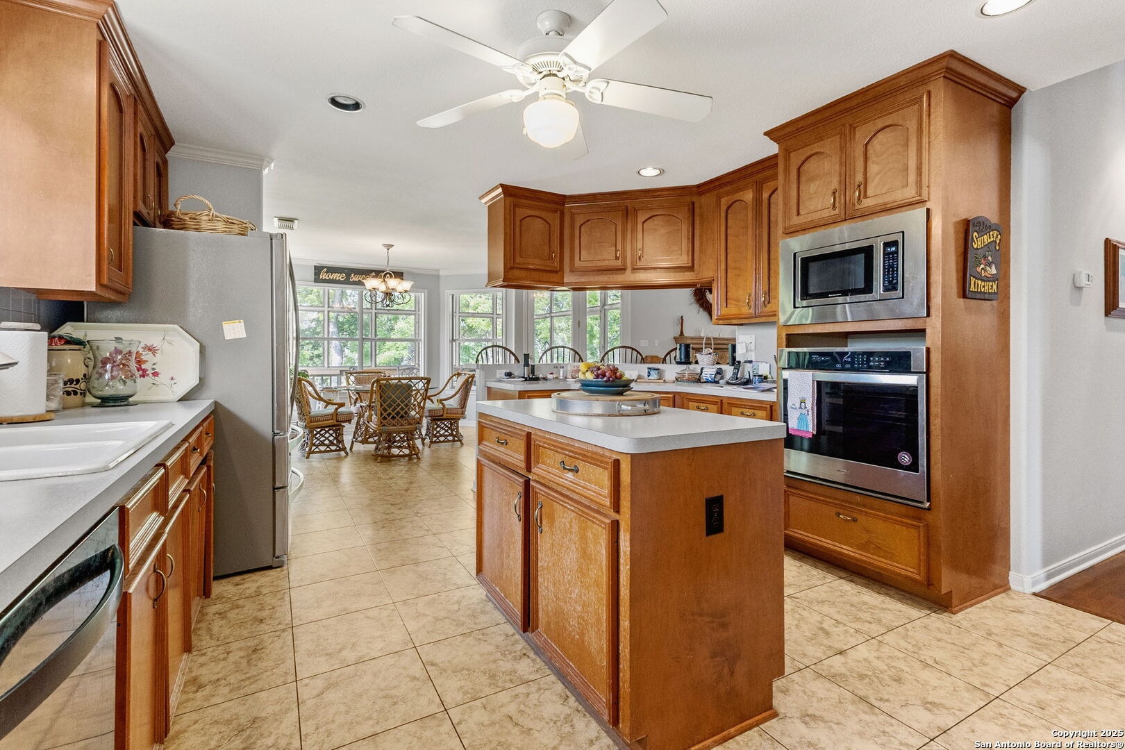 1434 Whispering Water Spring Branch, TX 78070 - Photo 13 of 45 a kitchen with a stove microwave and cabinets