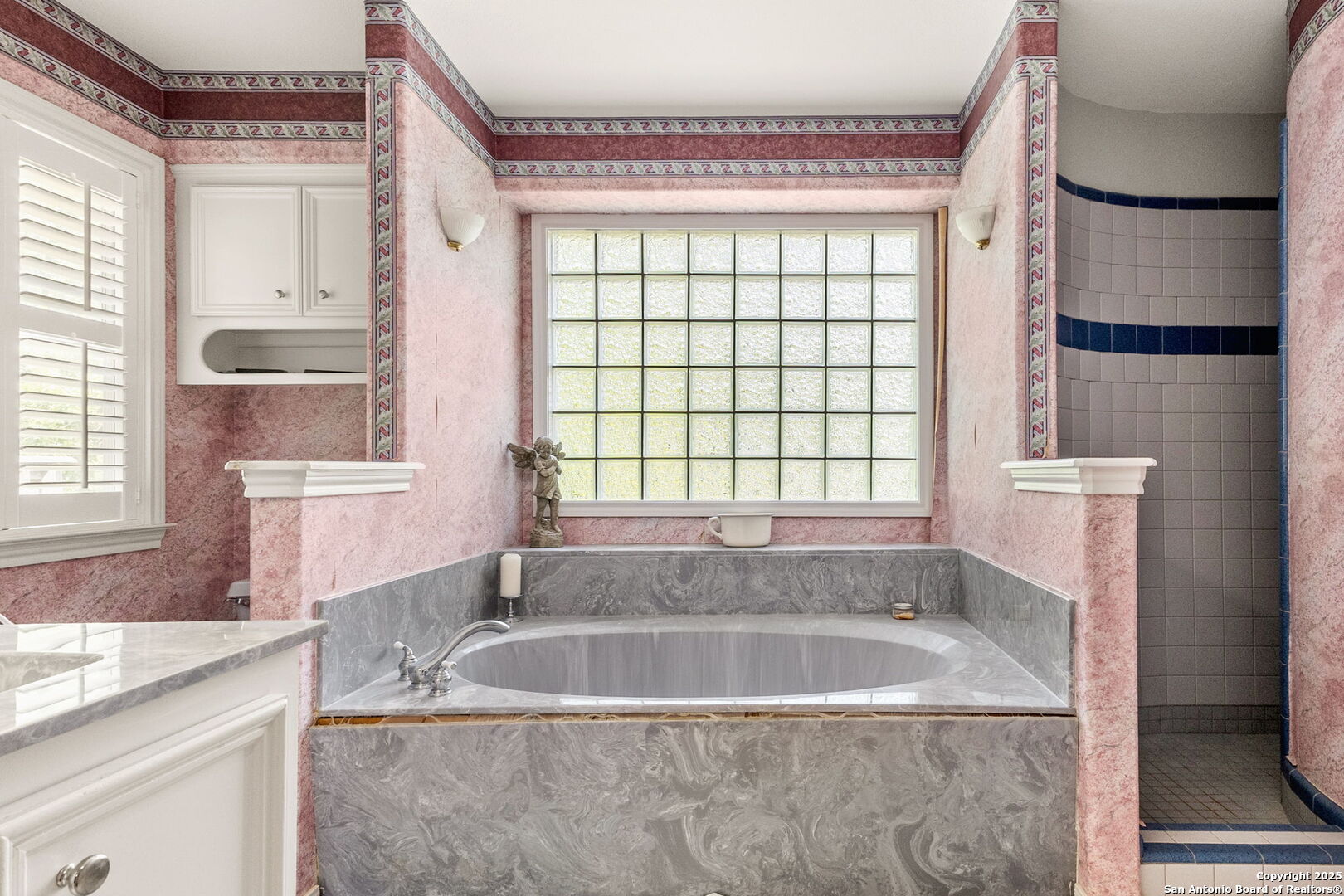 1434 Whispering Water Spring Branch, TX 78070 - Photo 19 of 45 a bath tub sitting in a bathroom next to a window
