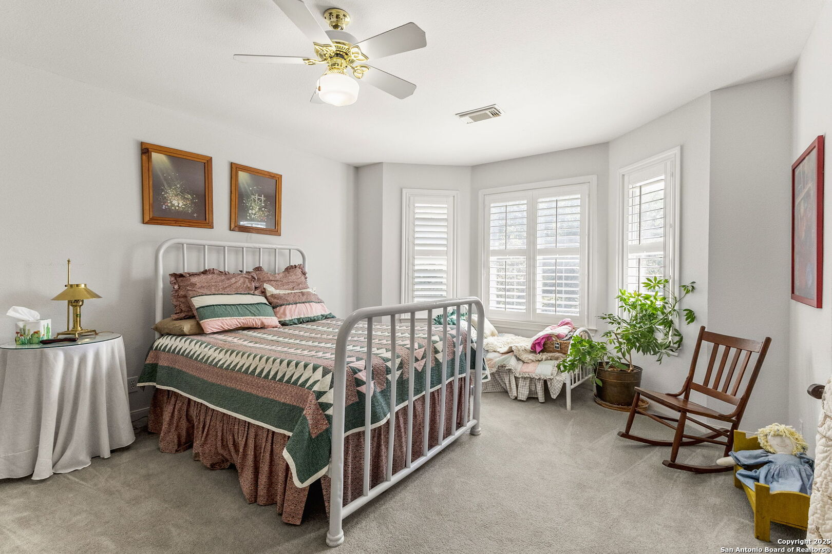 1434 Whispering Water Spring Branch, TX 78070 - Photo 24 of 45 a bedroom with a bed and a chandelier