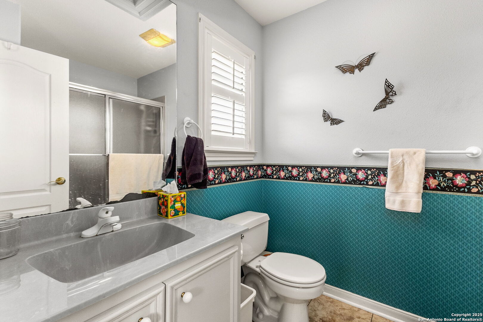 1434 Whispering Water Spring Branch, TX 78070 - Photo 27 of 45 a bathroom with a sink and a mirror