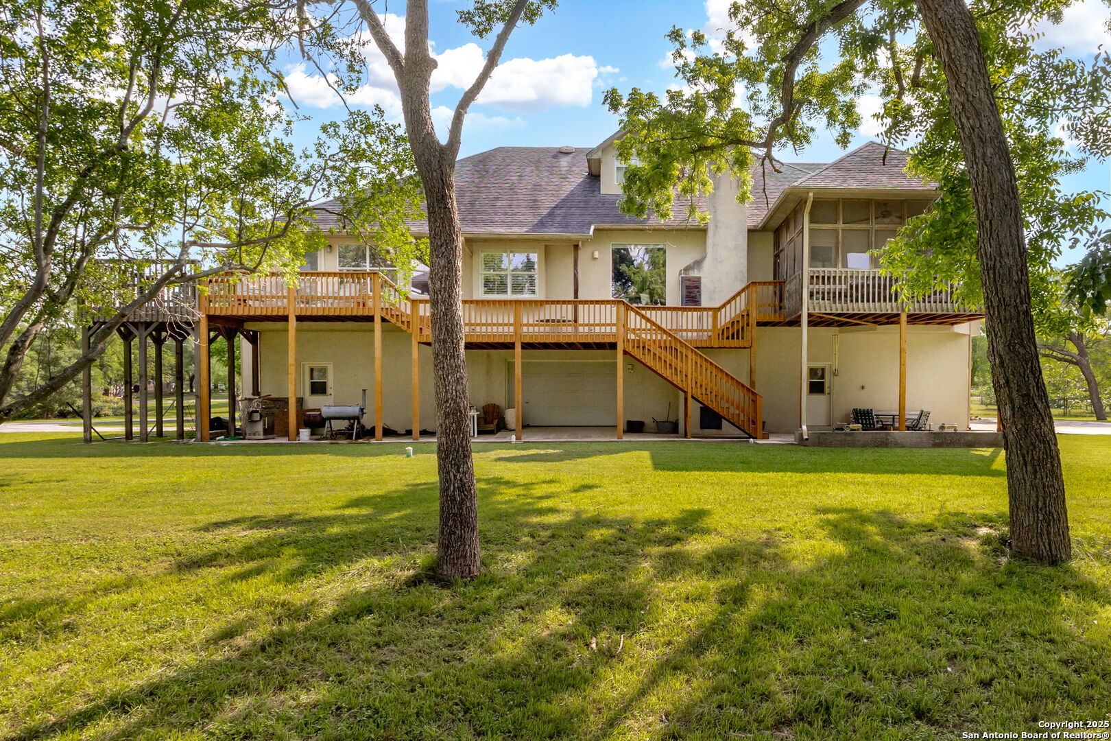 1434 Whispering Water Spring Branch, TX 78070 - Photo 39 of 45 a front view of a house with a garden