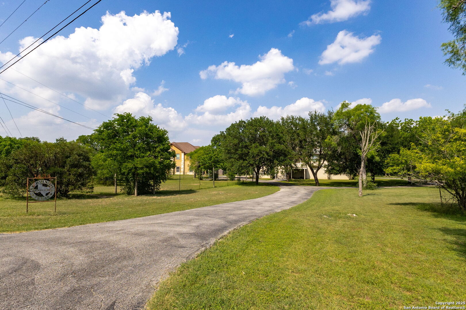 1434 Whispering Water Spring Branch, TX 78070 - Photo 4 of 45 a view of a golf course with a big yard