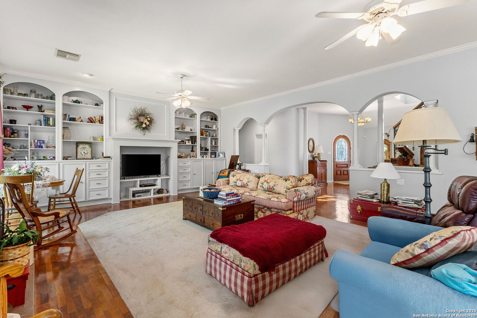 1434 Whispering Water Spring Branch, TX 78070 - Photo 9 of 45 a living room with furniture kitchen view and a fireplace
