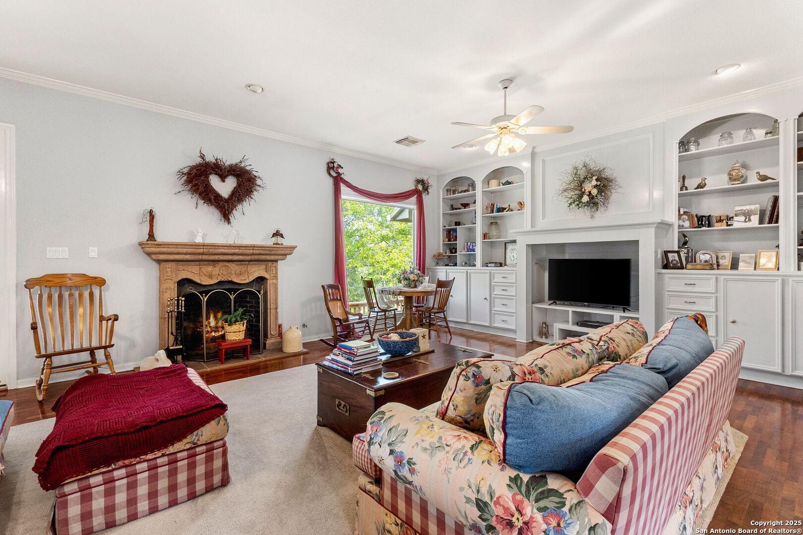 1434 Whispering Water Spring Branch, TX 78070 - Photo 10 of 45 a living room with furniture fireplace and flat screen tv