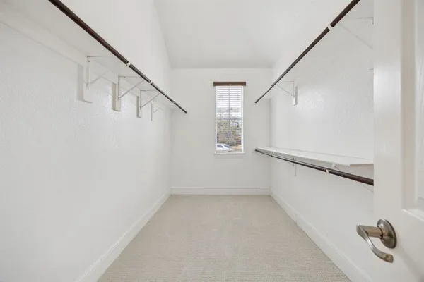 a view of hallway with stairs