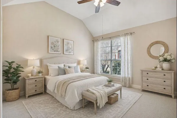 a bedroom with a bed and a dresser