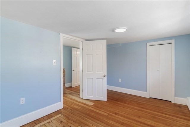 23 Sachem Street Revere, MA 02151 - Photo 12 of 17 a view of empty room with wooden floor