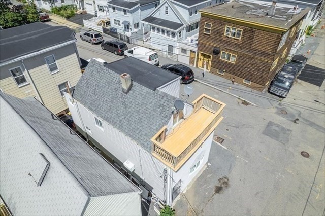 23 Sachem Street Revere, MA 02151 - Photo 15 of 17 an aerial view of a house with a swimming pool
