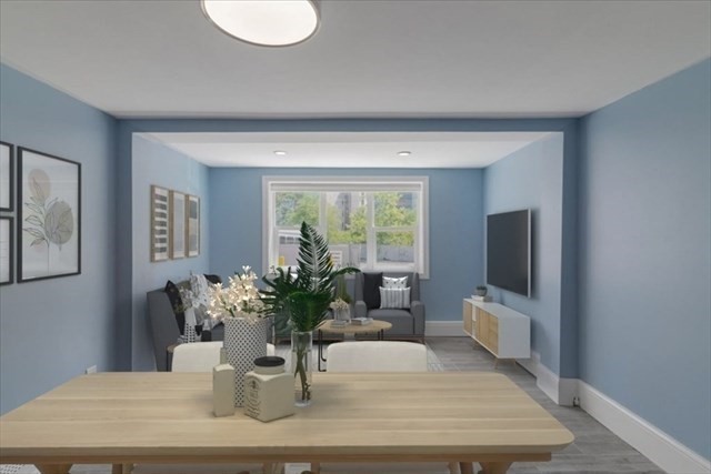 23 Sachem Street Revere, MA 02151 - Photo 2 of 17 a dining room with furniture and wooden floor