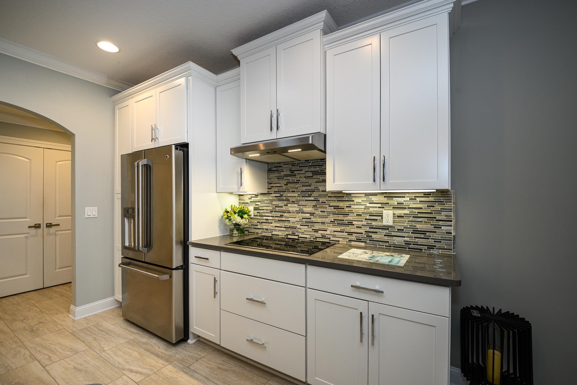 68 Ocale Court St. Augustine, FL 32084 - Photo 16 of 67 a kitchen with stainless steel appliances granite countertop a refrigerator and a sink
