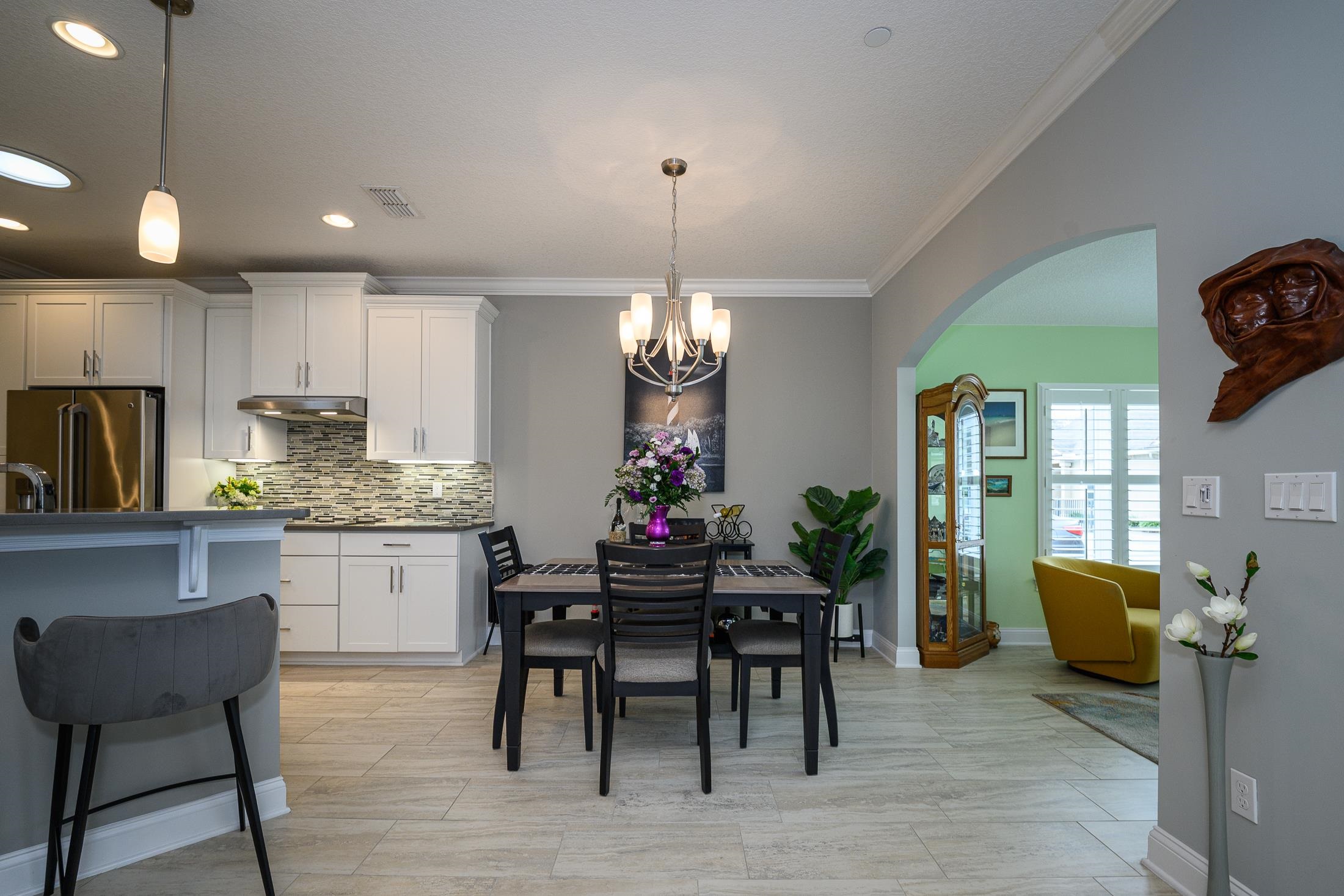 68 Ocale Court St. Augustine, FL 32084 - Photo 20 of 67 a view of a dining room with furniture window and wooden floor
