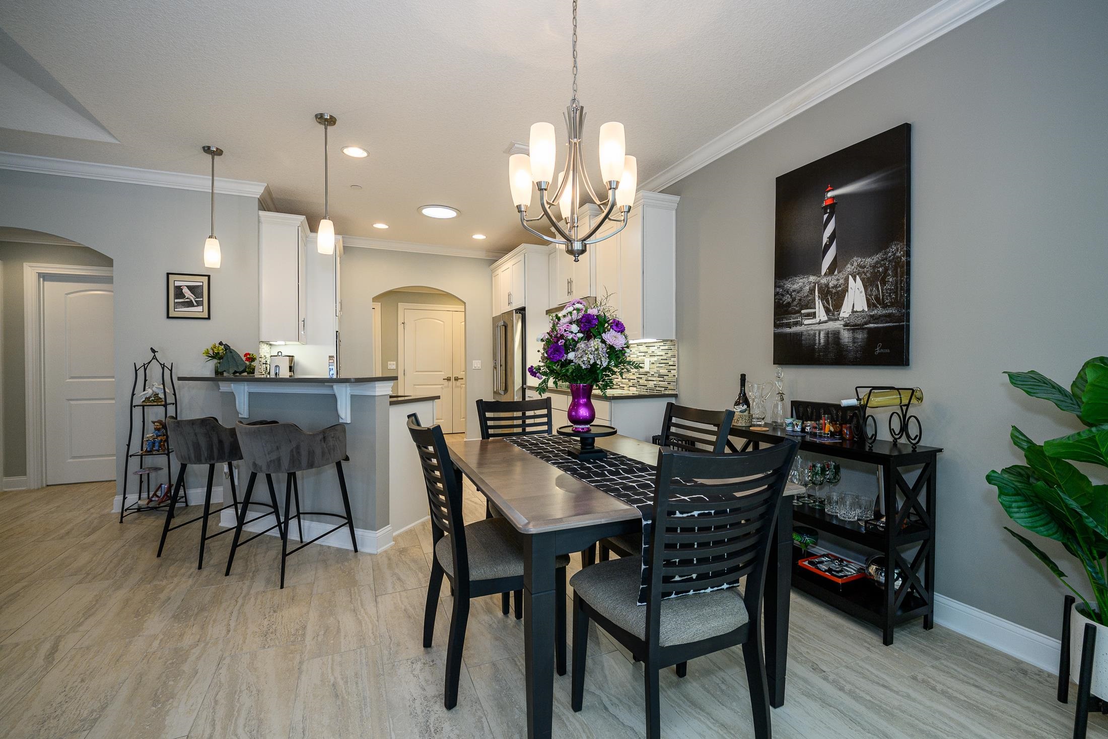 68 Ocale Court St. Augustine, FL 32084 - Photo 22 of 67 a view of a dining room with furniture and wooden floor
