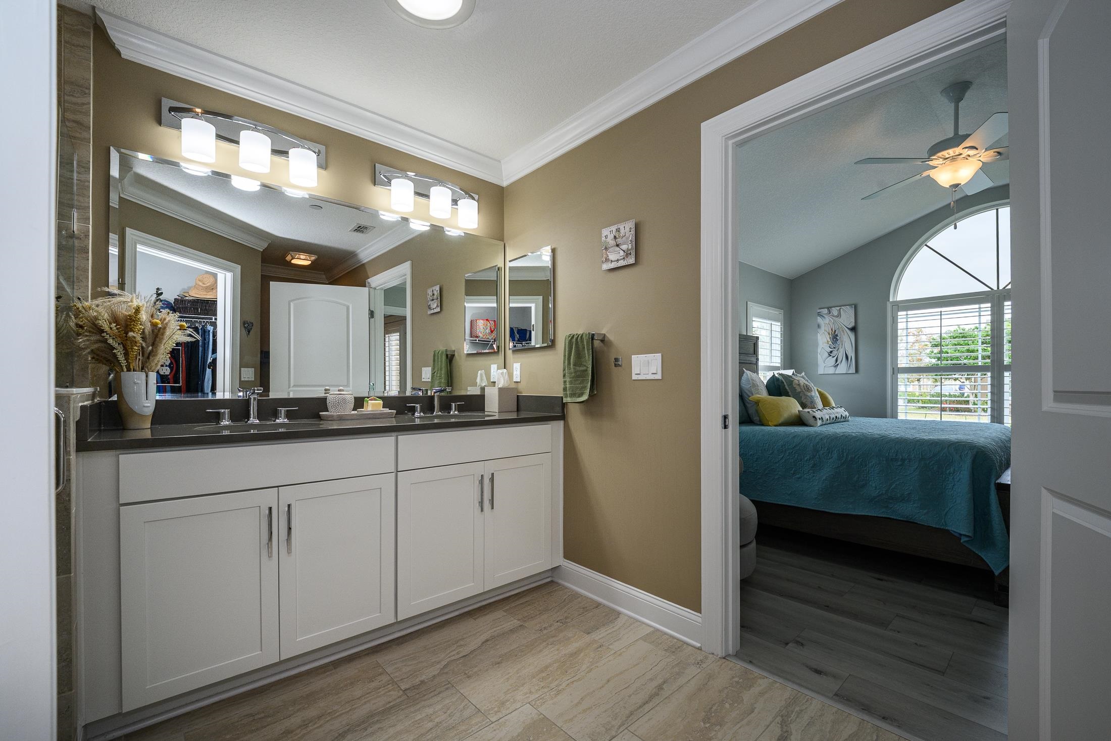 68 Ocale Court St. Augustine, FL 32084 - Photo 36 of 67 a en suite bathroom with a sink and a large mirror