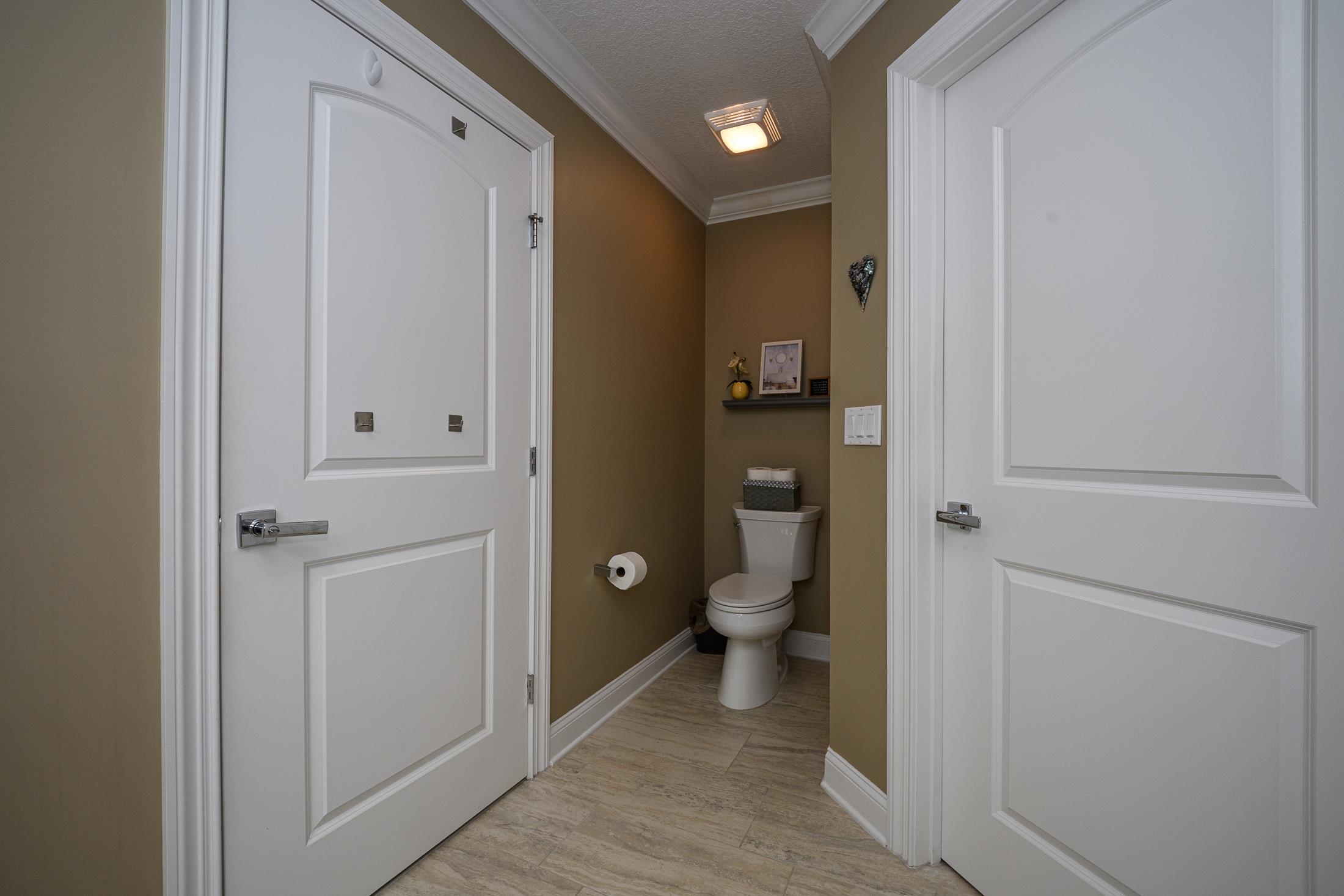 68 Ocale Court St. Augustine, FL 32084 - Photo 37 of 67 a bathroom with a granite countertop toilet and a sink