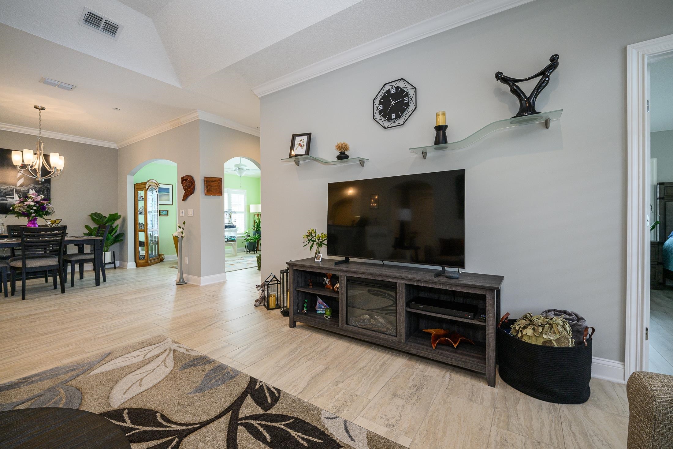 68 Ocale Court St. Augustine, FL 32084 - Photo 4 of 67 a living room with furniture and a flat screen tv
