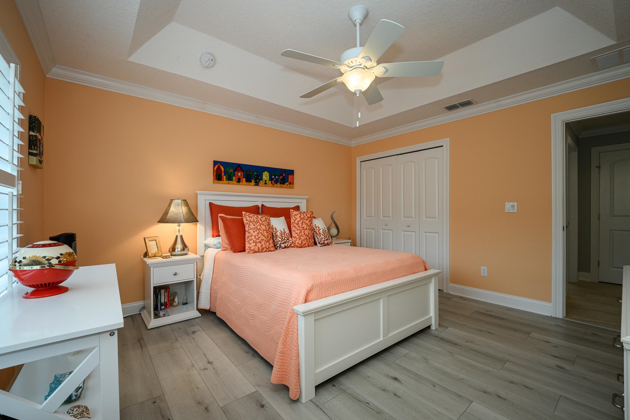 68 Ocale Court St. Augustine, FL 32084 - Photo 41 of 67 a bedroom with a bed and a chandelier