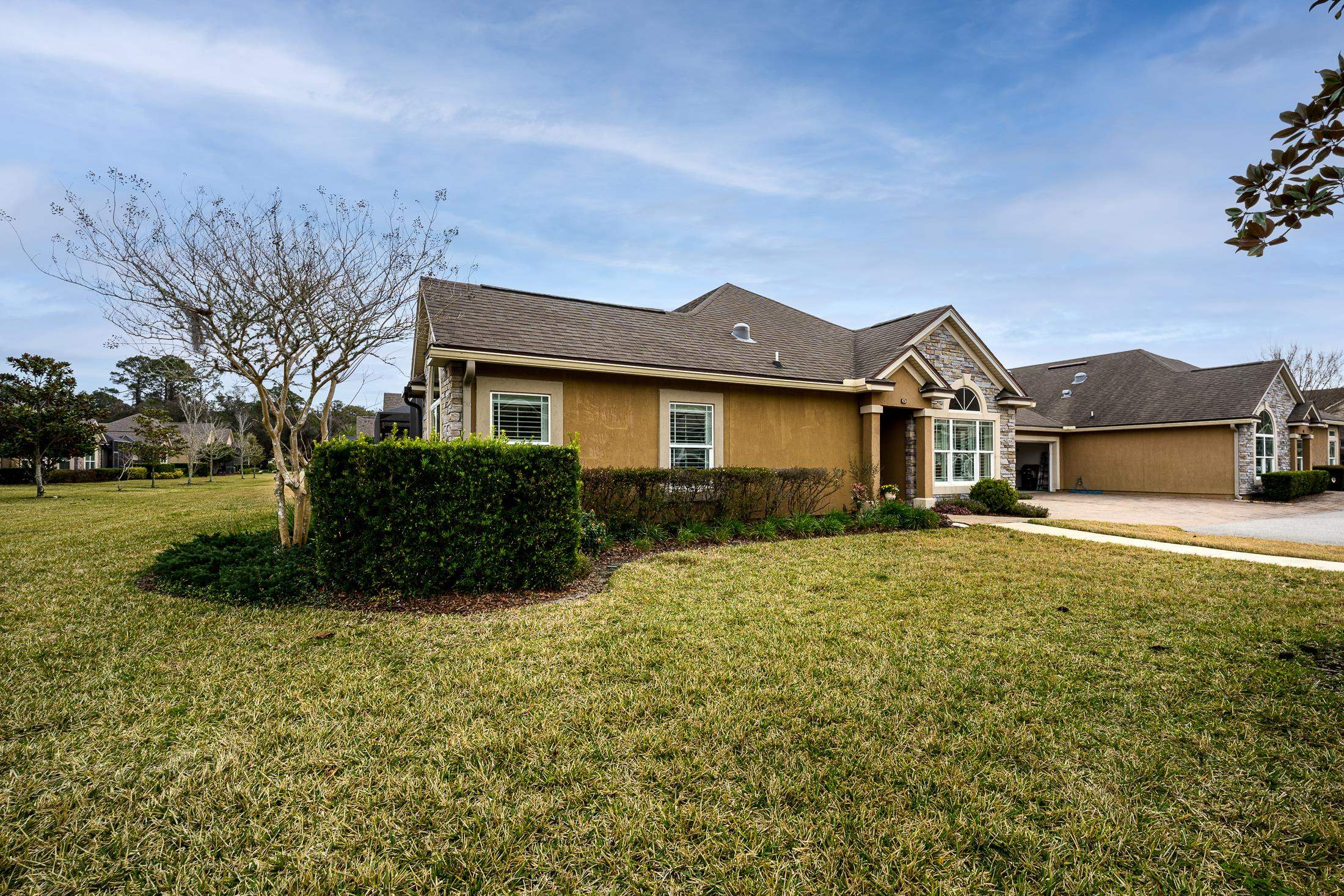 68 Ocale Court St. Augustine, FL 32084 - Photo 52 of 67 a front view of a house with a yard