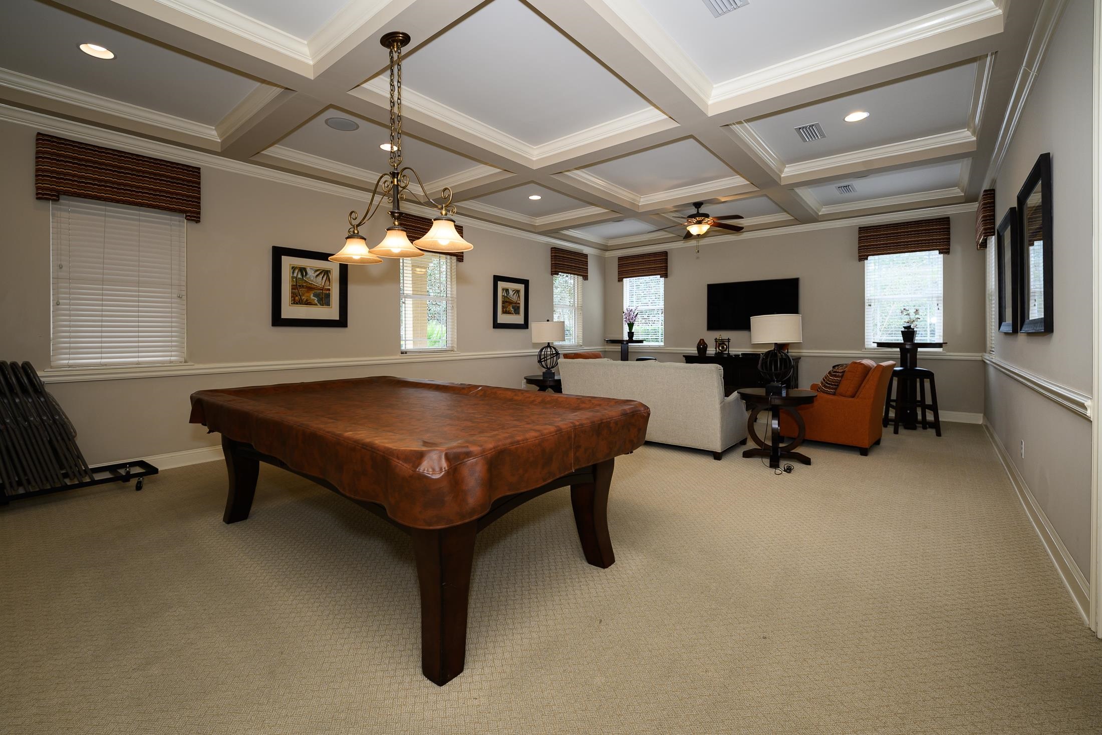 68 Ocale Court St. Augustine, FL 32084 - Photo 57 of 67 a living room with furniture a flat screen tv and a large window
