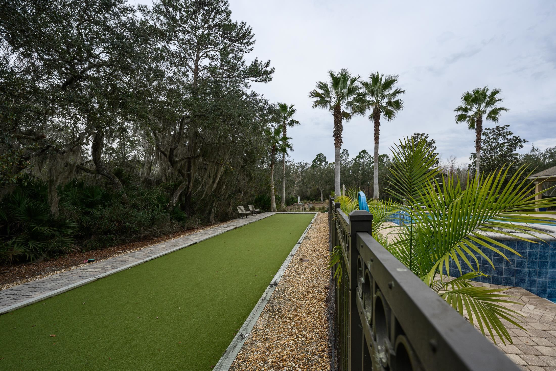 68 Ocale Court St. Augustine, FL 32084 - Photo 64 of 67 a view of a backyard with a garden