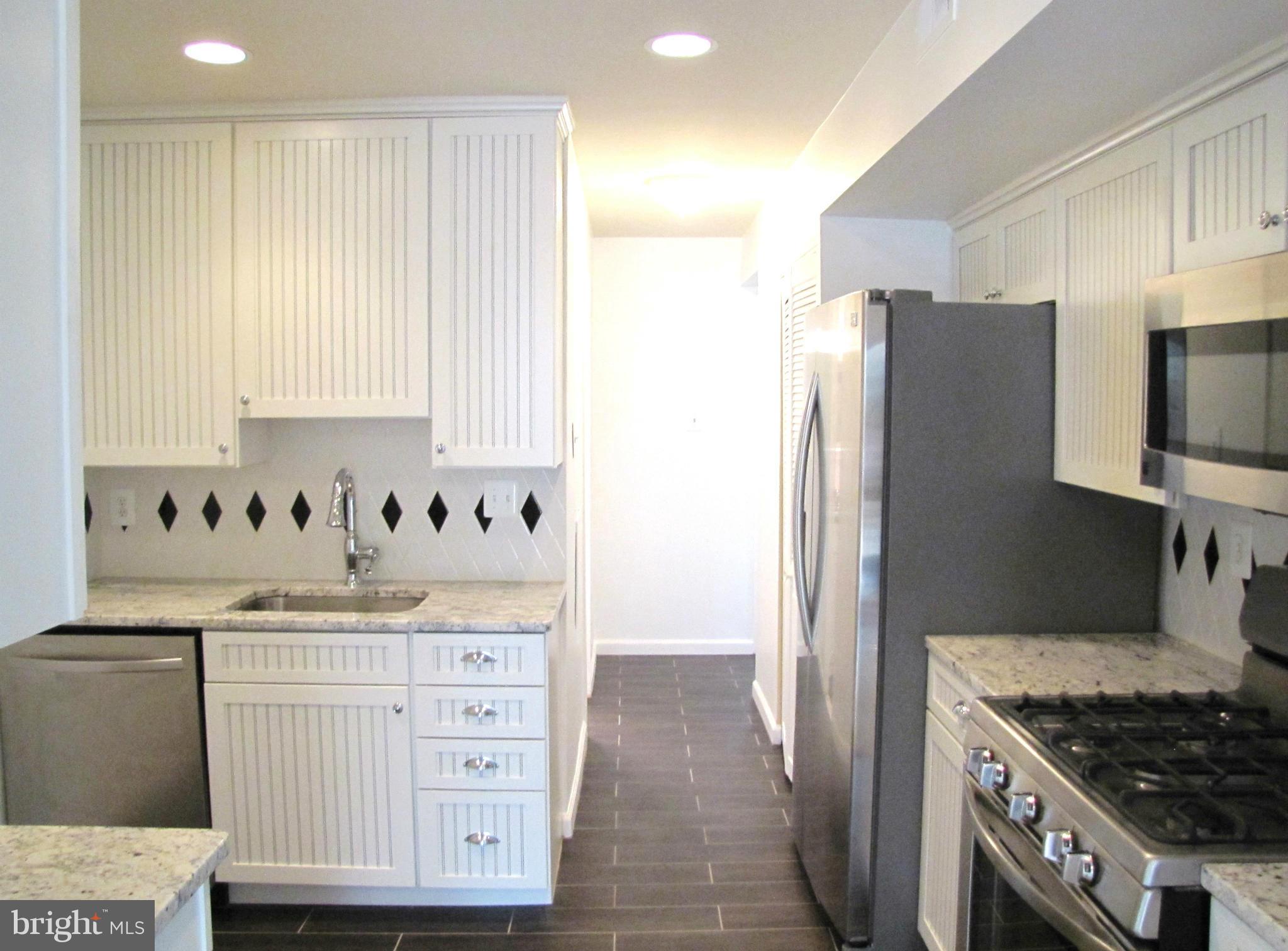2053 Royal Fern Court, Unit 2B Reston, VA 20191 - Photo 3 of 18 Kitchen