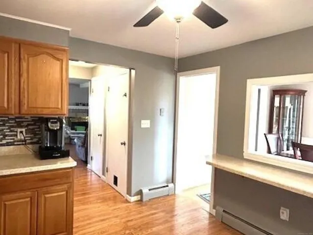 a view of a room with a large window