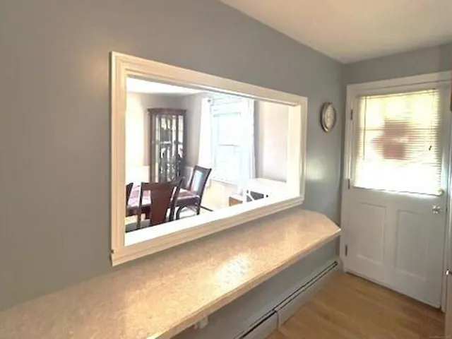 a kitchen with stainless steel appliances granite countertop a sink and a granite counter tops