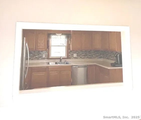 a view of balcony with furniture