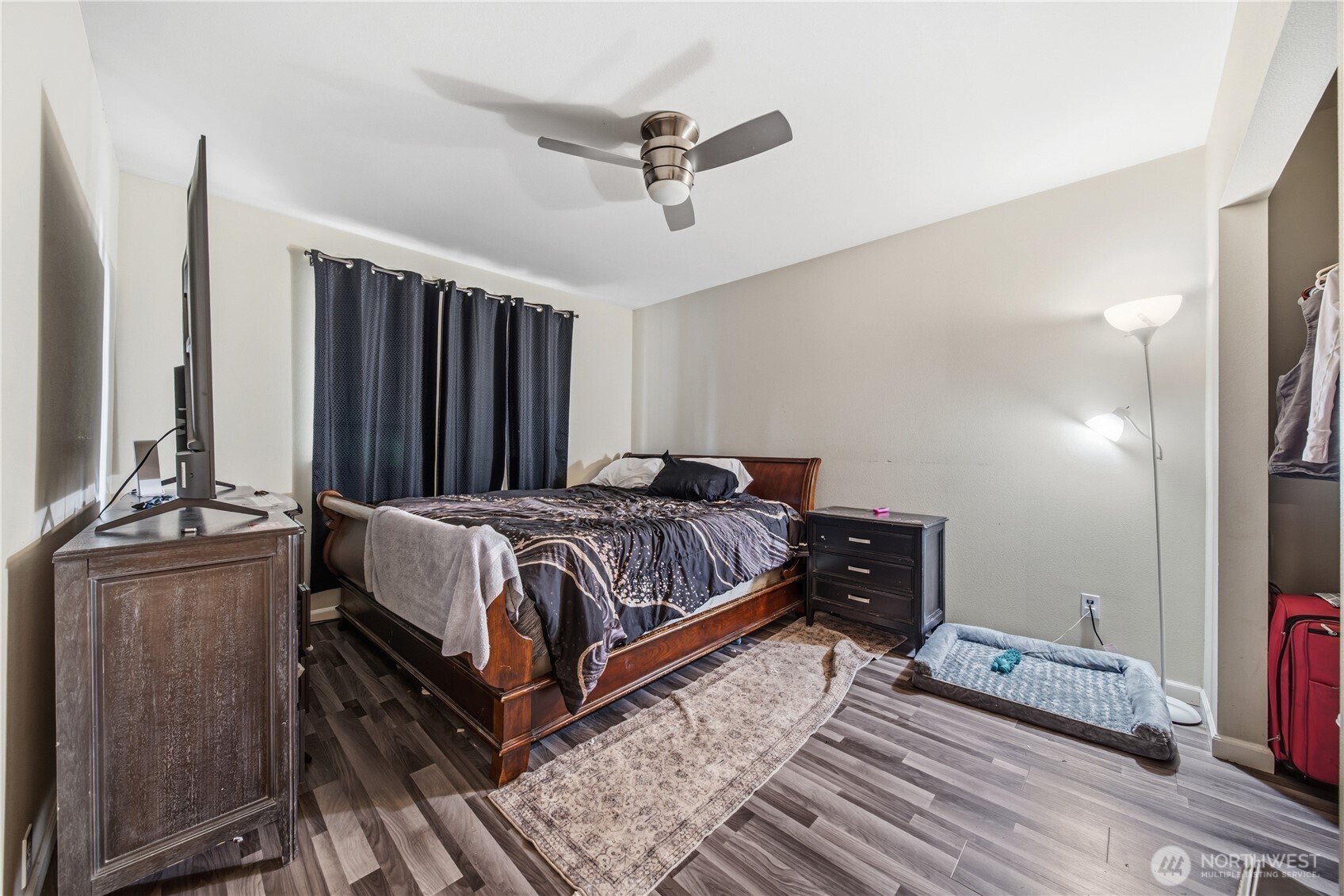7516 Skinner Road Granite Falls, WA 98252 - Photo 26 of 40 a bedroom with a bed dresser and a window
