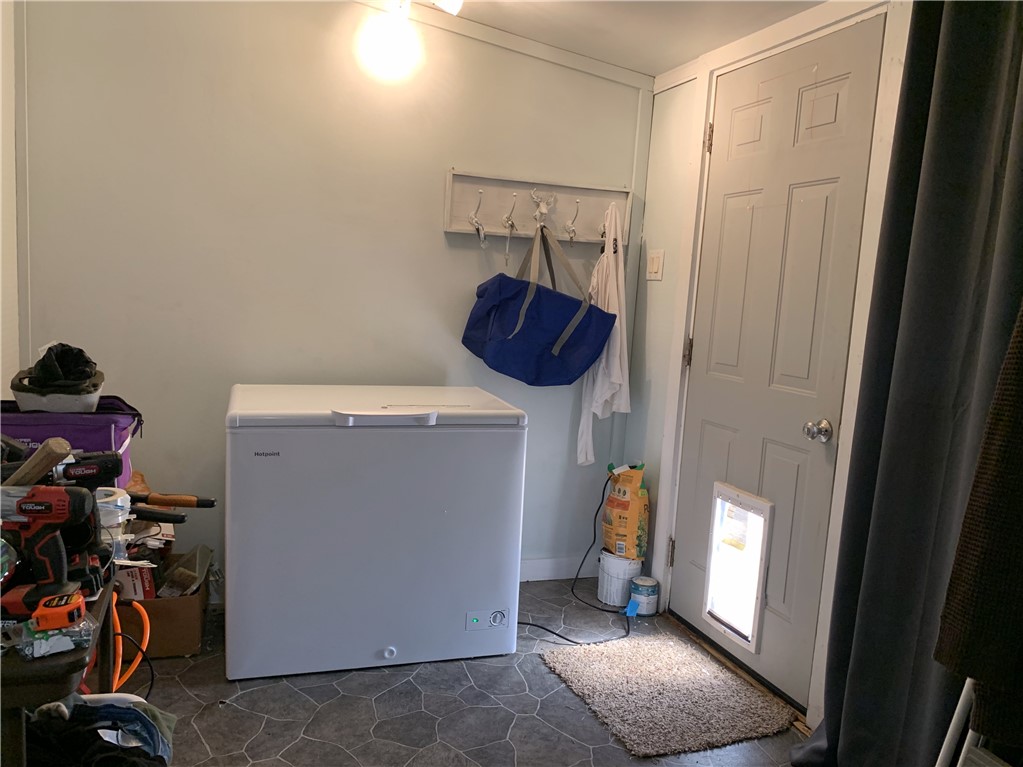 706 West Navasota Street Groesbeck, TX 76642 - Photo 13 of 18 a view of storage and utility room with closet and a window