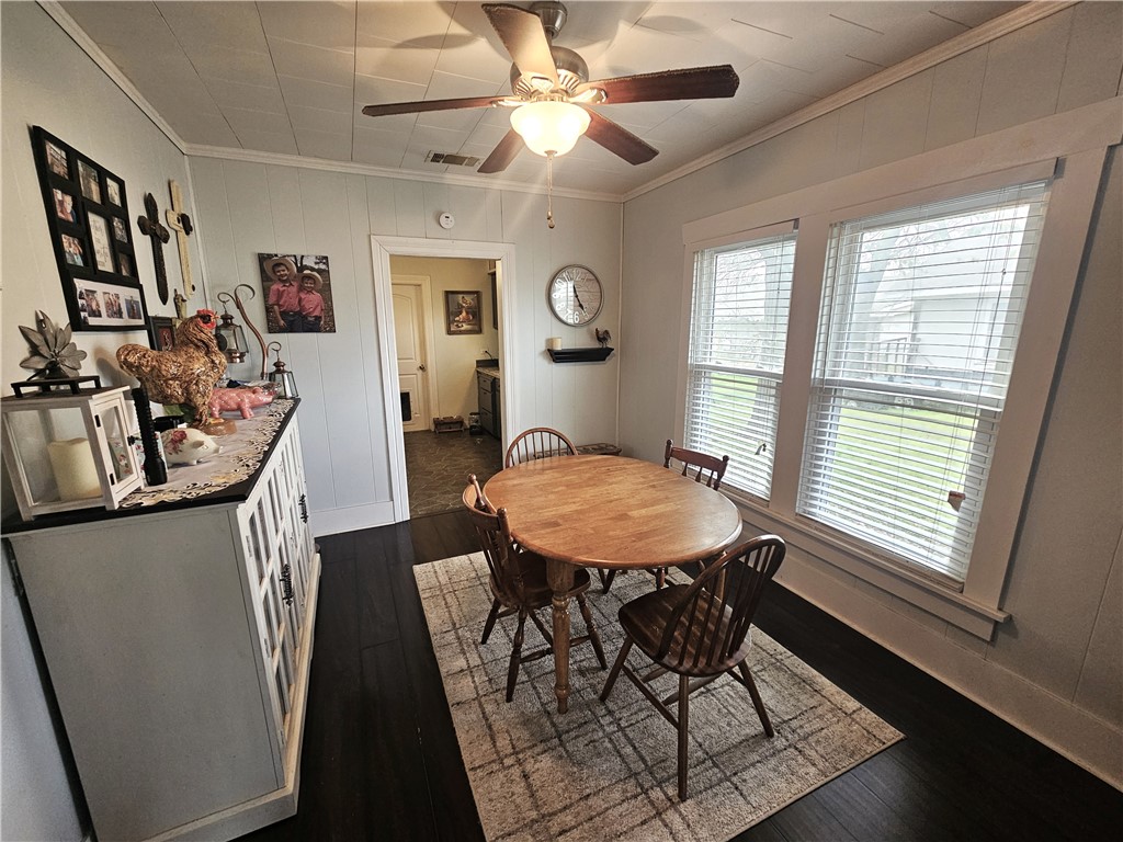706 West Navasota Street Groesbeck, TX 76642 - Photo 4 of 18 a view of a dining room with furniture window and wooden floor