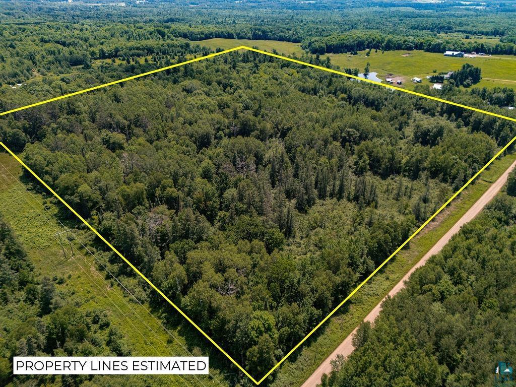 2592 Strandberg Road Barnum, MN 55707 - Photo 4 of 44 Expansive wooded acreage featuring mature trees and a perimeter road