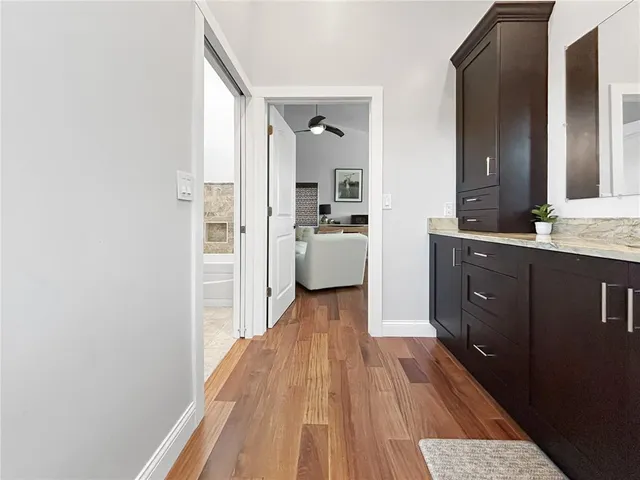 a view of a bathroom from the hallway