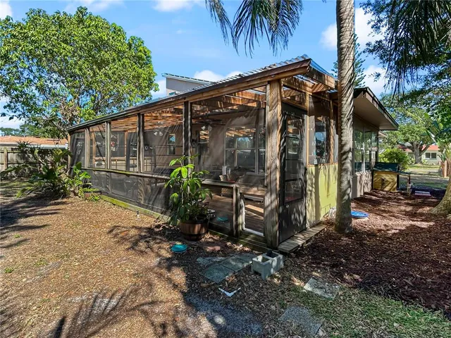 a view of a back yard of the house