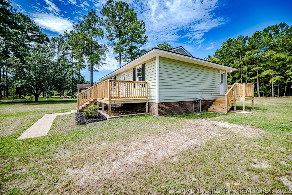 192 Cypress Road Cameron, NC 28326 - Photo 26 of 26 a view of a house with a yard